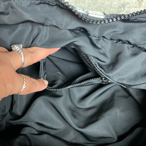 Marc Jacob’s black floral diaper bag with changing pad. - Picture 15 of 16